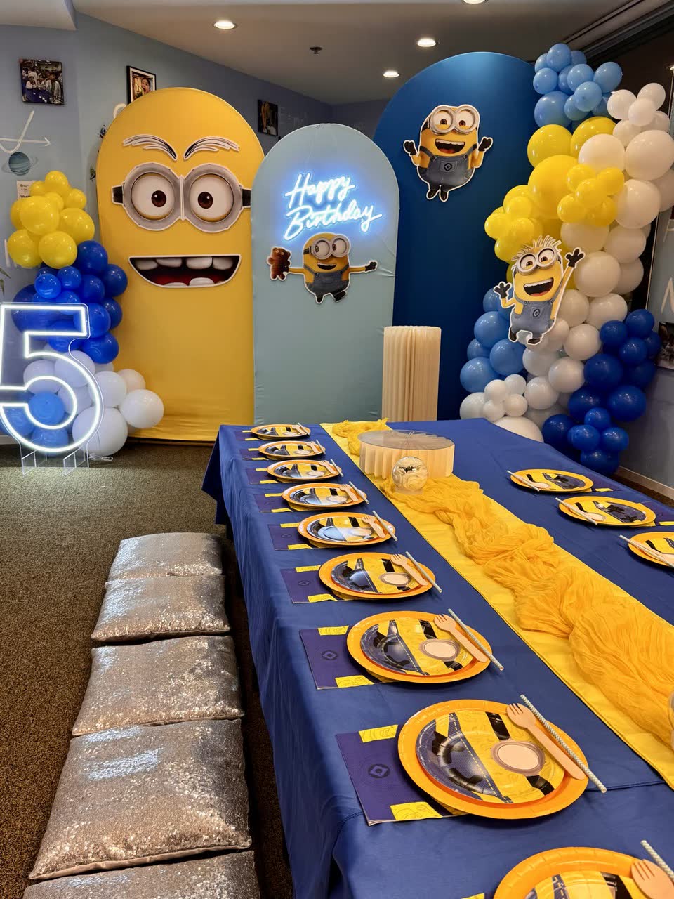 Minions-themed birthday party set-up with balloon arch and decorated table at Newtonshow Hong Kong