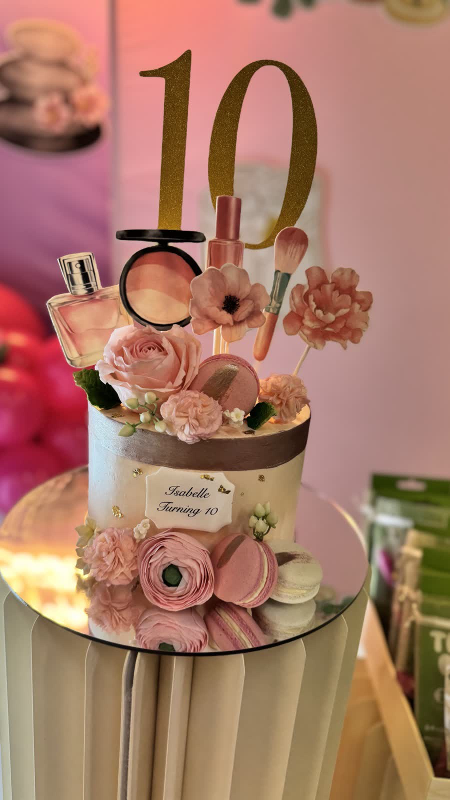 Pink and lilac spa party backdrop with balloons at a Newtonshow birthday party in Hong Kong